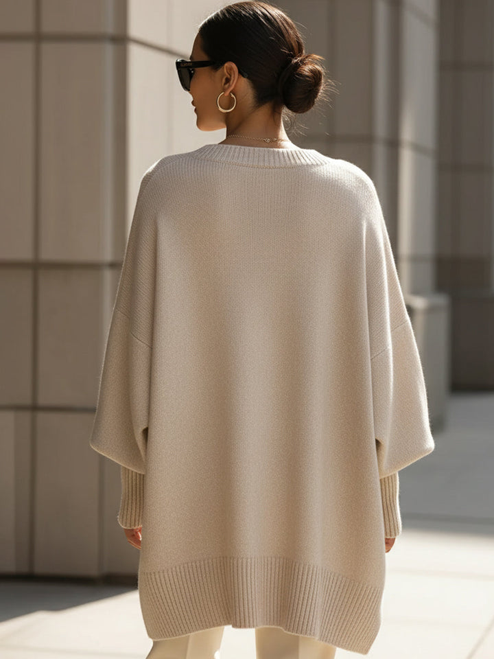 Kvinnegenser | Oversized Poncho med Ribbestrikket Kant