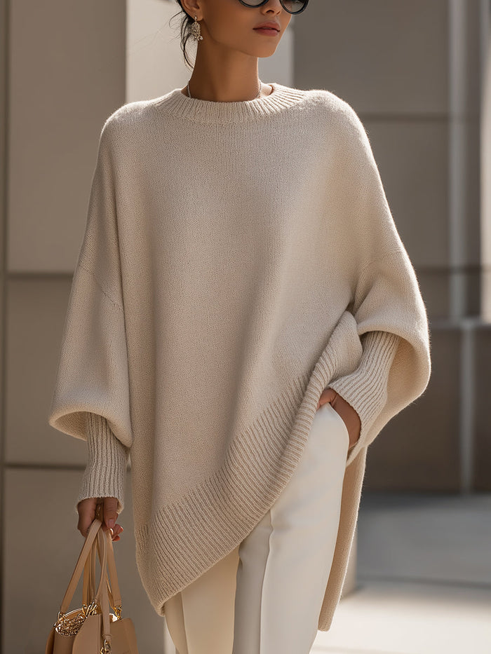 Kvinnegenser | Oversized Poncho med Ribbestrikket Kant