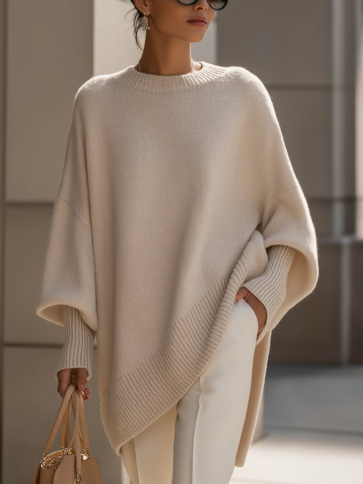 Kvinnegenser | Oversized Poncho med Ribbestrikket Kant