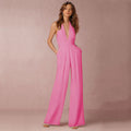 Kvinnes Vid-Ben Jumpsuit | Halter Dyp V