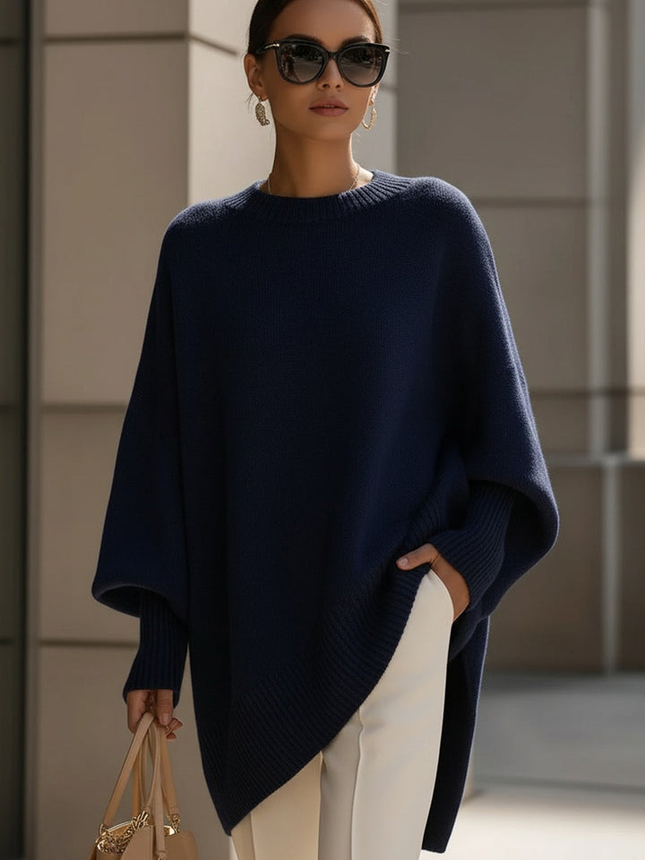 Kvinnegenser | Oversized Poncho med Ribbestrikket Kant