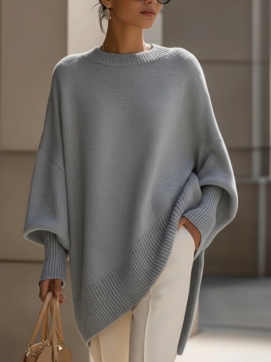 Kvinnegenser | Oversized Poncho med Ribbestrikket Kant