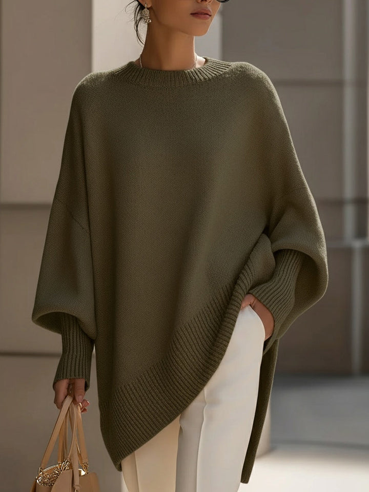 Kvinnegenser | Oversized Poncho med Ribbestrikket Kant